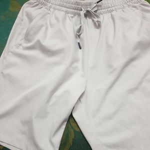 Felt shorts with horizontal pockets